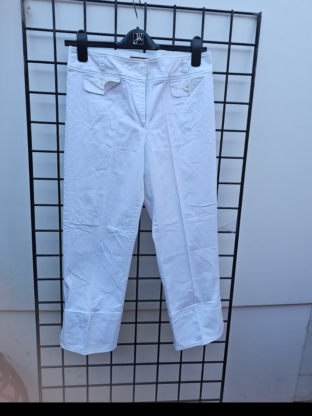 Clean White Capri Pants with Button-Flap Pockets
